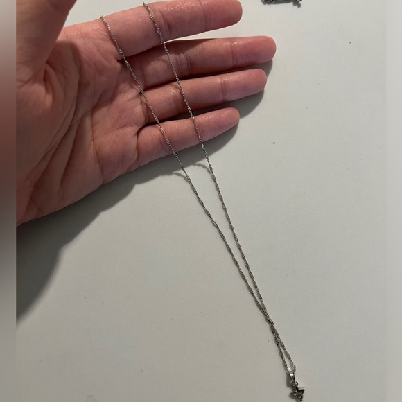 1.0 mm 14k solid rope necklace chain with a small 14k pendant. - Picture 3 of 6